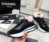 Женские комбинированные кроссовки Chanel черные с розовым мехом 2024