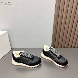 Женские замшевые кроссовки на меху Brunello Cucinelli черные с кожаными вставками 2024