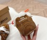 Женские замшевые кроссовки Miu Miu & New Balance коричневые на меху с разноцветными шнурками 2024
