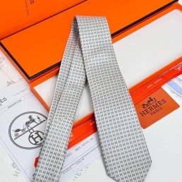 Мужской шелковый галстук Hermes светло-серый с буквами 150 см 2024