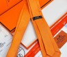 Мужской шелковый галстук Hermes оранжевый с логотипами 150 см 2024