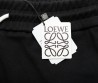 Женские штаны Loewe черные с белыми полосами 2024