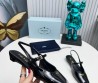 Кожаные босоножки Prada черные лакированные 2025