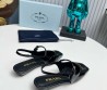 Кожаные босоножки Prada черные лакированные 2025