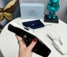 Кожаные босоножки Prada белые лакированные 2025