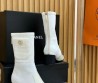 Женские комбинированные сапоги Chanel белые с черным 2025
