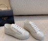 Женские кожаные кеды Prada Naplak белые лакированные 2025