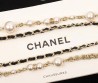 Женское колье Chanel серебристое с жемчужинами и бантиками 2025