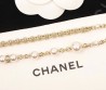 Женское колье Chanel серебристое с жемчужинами и бантиками 2025