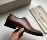 Мужские кожаные туфли Santoni коричневые 2025