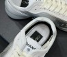 Женские кожаные кроссовки Chanel белые с серебристыми вставками 2025