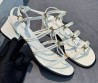 Женские кожаные босоножки Celine белые лакированные 2025