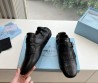 Женские кожаные лоферы Prada черные с бахромой 2025