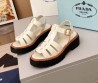 Женские кожаные сандалии Prada белые глянцевые 2025