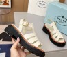 Женские кожаные сандалии Prada белые глянцевые 2025