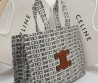 Женская текстильная сумка Celine белая с черными надписями 40х28 2025