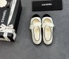 Женские кожаные балетки Chanel белые с черным носом с бантом 2025