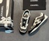 Женские кожаные кроссовки Chanel с замшевыми вставками черные с белым 2025