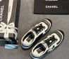 Женские кожаные кроссовки Chanel с замшевыми вставками черные с белым 2025