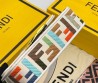Женская текстильная сумка Fendi белая с разноцветными буквами 20х10 2025