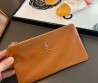 Женская кожаная сумка Saint Laurent коричневая 41х33х30 2025