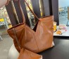 Женская кожаная сумка Saint Laurent коричневая 41х33х30 2025
