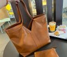 Женская кожаная сумка Saint Laurent коричневая 41х33х30 2025