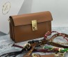 Женская кожаная сумка Prada коричневая 24х20х8 2025