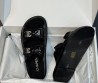 Женские кожаные шлепанцы Chanel черные глянцевые 2025