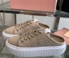 Женские текстильные кеды Miu Miu бежевые без пятки 2025