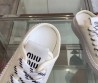 Женские текстильные кеды Miu Miu белые без пятки 2025