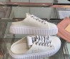 Женские текстильные кеды Miu Miu белые без пятки 2025