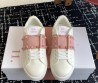 Женские кожаные кроссовки Valentino Rockstud Untitled белые с розовым 2025