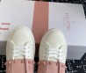 Женские кожаные кроссовки Valentino Rockstud Untitled белые с розовым 2025
