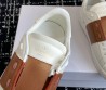 Женские кожаные кроссовки Valentino Rockstud Untitled белые с коричневым 2025