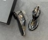 Женские кожаные сандалии Saint Laurent черные лакированные 2025