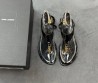 Женские кожаные сандалии Saint Laurent черные лакированные 2025