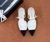 Женские текстильные туфли Chanel белые с черным носом 2025