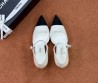 Женские текстильные туфли Chanel белые с черным носом 2025