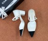 Женские текстильные туфли Chanel белые с черным носом 2025