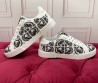 Женские комбинированные кеды Dolce & Gabbana белые с черным 2025
