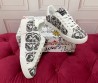 Женские комбинированные кеды Dolce & Gabbana белые с черным 2025
