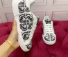 Женские комбинированные кеды Dolce & Gabbana белые с черным 2025