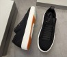 Мужские текстильные кеды Santoni черные с кожаными элементами 2025