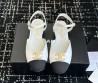 Женские кожаные босоножки Chanel Goatskin Grosgrain белые с черным текстильным носом 2025