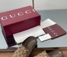 Женские текстильные мюли Gucci коричневые с орнаментом GG 2025