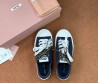 Женские текстильные кеды Miu Miu синие с разноцветными шнурками 2025