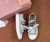 Женские текстильные кеды Miu Miu бежевые с разноцветными шнурками 2025