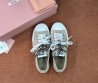Женские текстильные кеды Miu Miu бежевые с разноцветными шнурками 2025