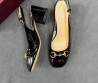 Женские кожаные туфли Gucci черные лакированные с пряжкой 2025